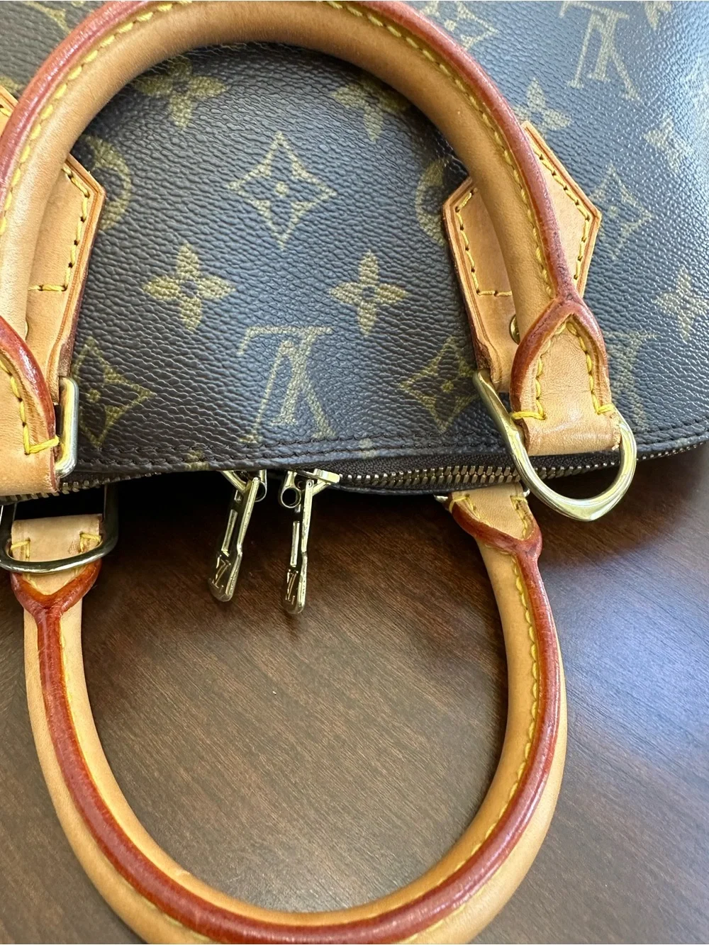 Louis Vuitton Monogram Alma PM Handbag in Brown and Tan